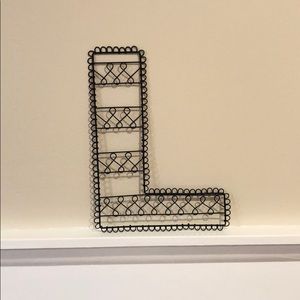 L wall or shelf decor.